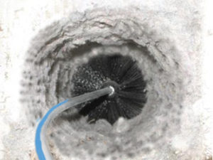 rotating brush, cleaning lint from inside a dryer vent