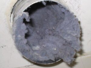 lint clogging a dryer vent, smaller
