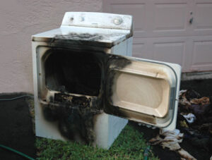 Dryer lint fire caused by restricted dryer vent.